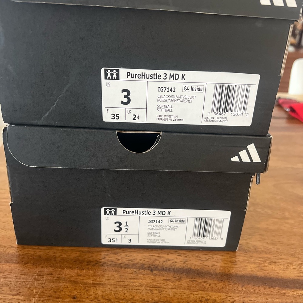 Adidas PureHustle 3 MD K Cleats in Black and White